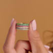 Birthstone eternity ring with colorful gemstone accents, shown on a clean neutral background
