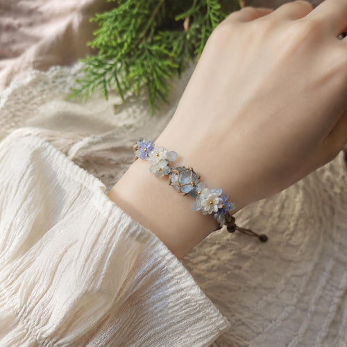 Blue Crystal Flower Bracelet: Adjustable Woven Cord Jewelry
