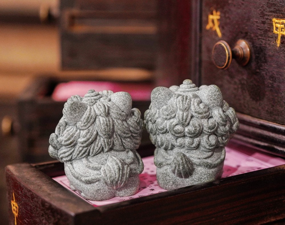 Pair of miniature foo dog stone statues inspired by guardian lion statues